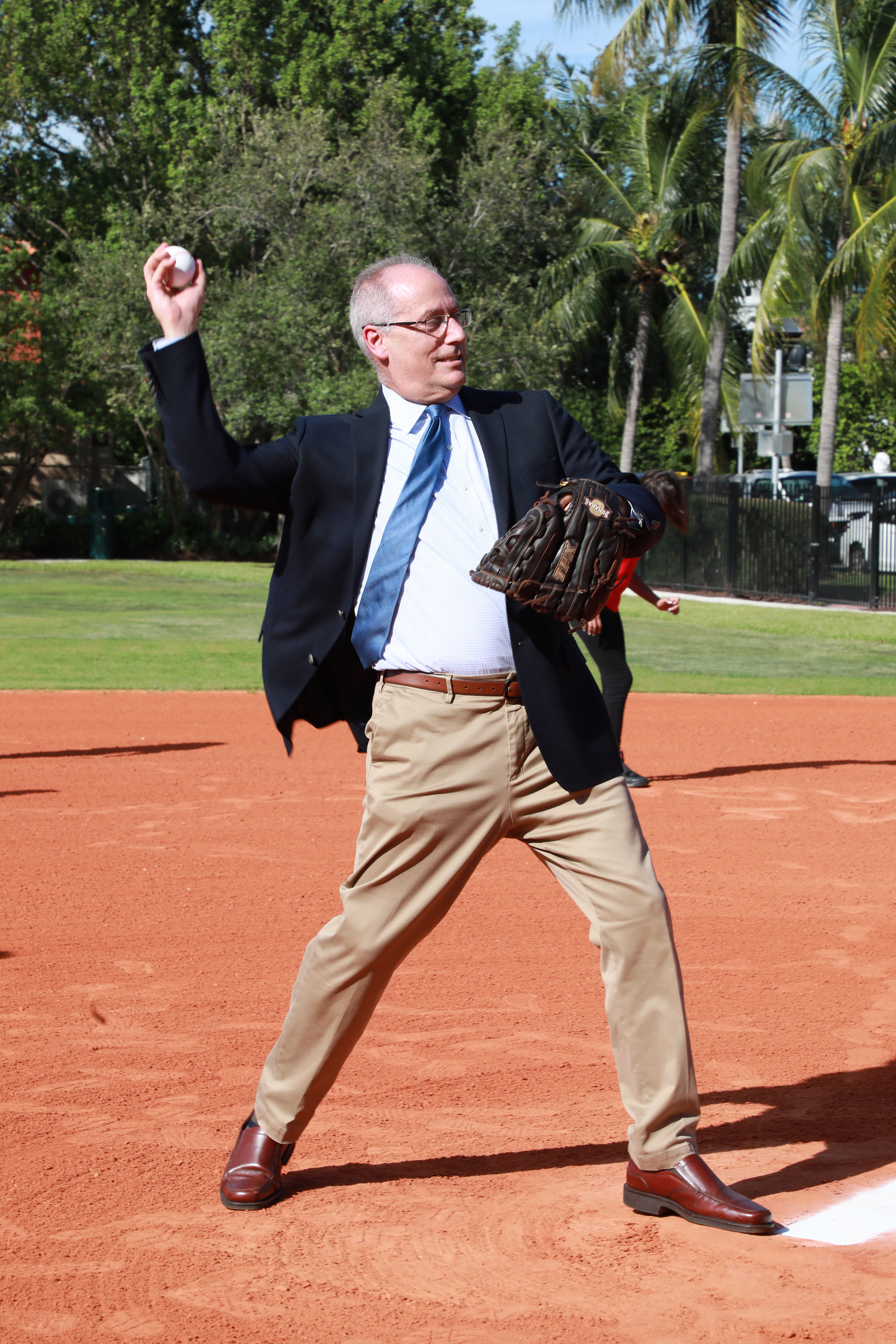 Mayor Gelber throwing the first official pitch on the new field.