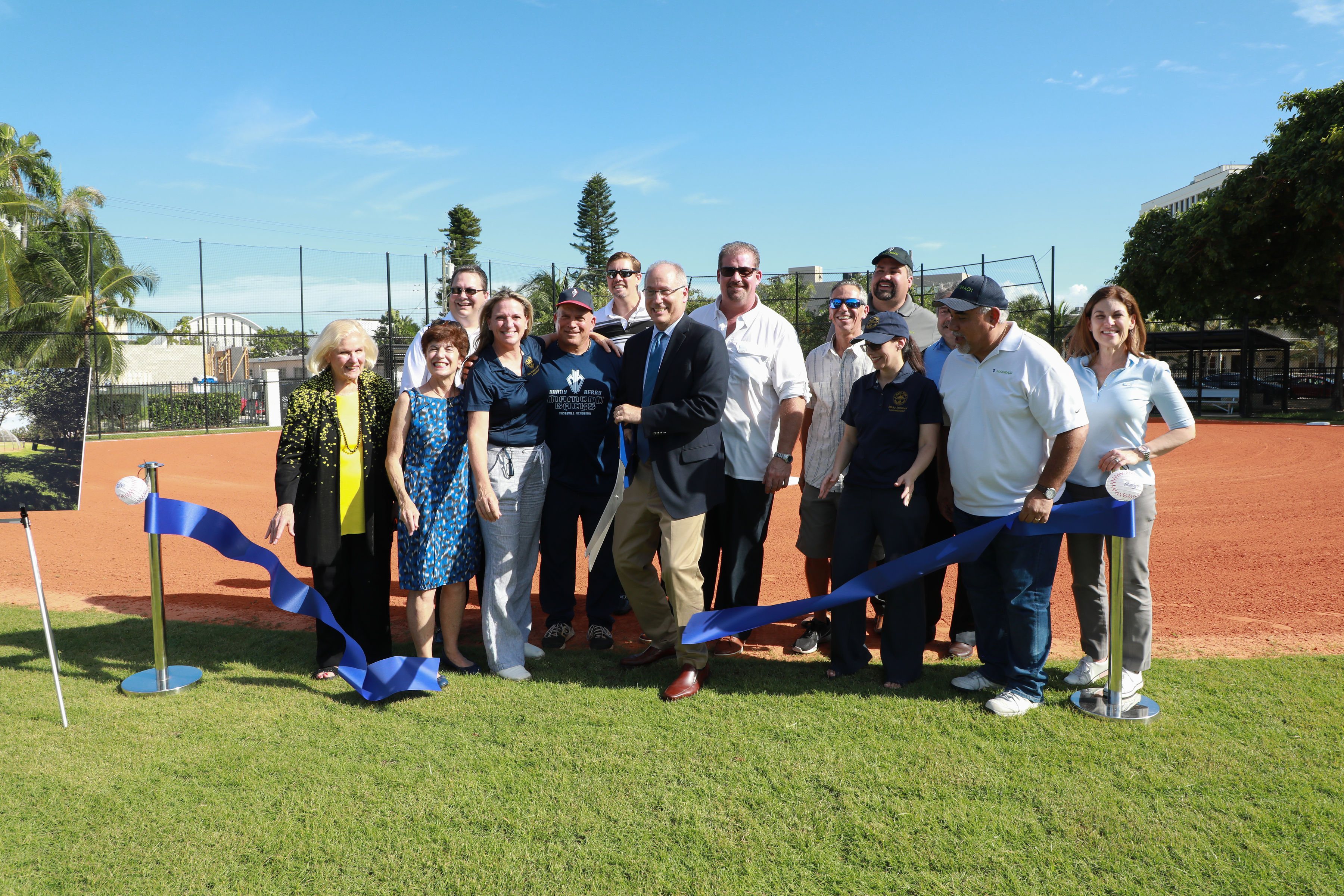 City leaders cutting ribbon at the new and improved Polo Park.