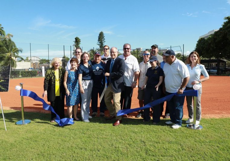 City leaders cutting ribbon at the new and improved Polo Park.